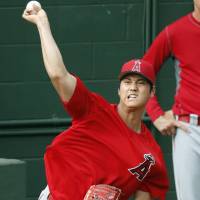 The Angels’ Shohei Ohtani pitches in a simulated game on Monday in Tempe, Arizona. Shohei Ohtani tosses 29 pitches in simulated game