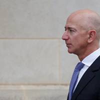 Amazon founder Jeff Bezos arrives for the memorial service of U.S. Sen. John McCain (R-AZ) at the National Cathedral in Washington Saturday. Always 'leaning into the future,' Jeff Bezos rockets to richest person on the planet, worth $166 billion