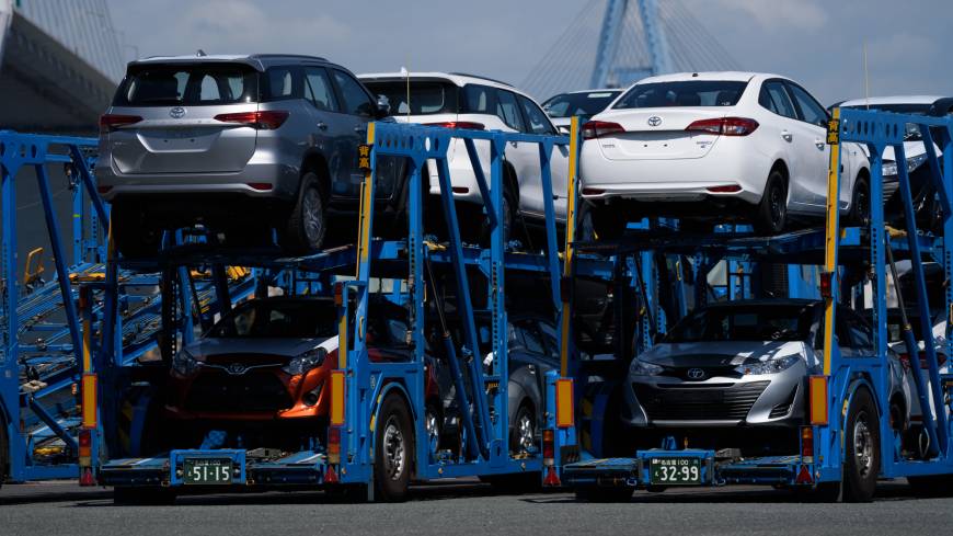 Toyota Motor Corp. vehicles are seen in car carrier trailers at Nagoya Port on July 31. Japan’s exports rose 6.6 percent in August from a year earlier. Japan exports rise on growing U.S.-bound shipments amid trade war fears