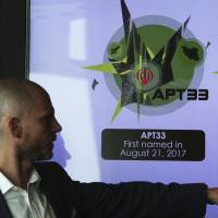 Alister Shepherd, the director of a subsidiary of the cybersecurity firm FireEye, gestures during a presentation about the APT33 hacking group, which his firm suspects are Iranian government-aligned hackers, in Dubai, United Arab Emirates, Tuesday. FireEye warned Tuesday that Iranian government-aligned hackers have stepped up their efforts in the wake of President Donald Trump pulling America from the nuclear deal. More Iran hacks targeted Mideast energy firms as U.S. sanctions loomed: FireEye