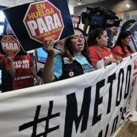 McDonald’s workers protest inside a McDonalds restaurant in South Los Angeles on Tuesday. Emboldened by the #MeToo movement, McDonald’s workers have voted to stage a one-day strike next week at restaurants in 10 cities in hopes of pressuring management to take stronger steps against on-the-job sexual harassment. McDonald's workers in 10 U.S. cities stage day strike over sexual harassment