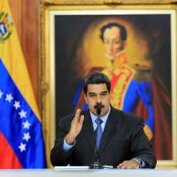 Venezuelan President Nicolas Maduro speaks during a meeting with government officials at the Miraflores Palace in Caracas Aug. 7. Maduro heads to China in bid to bolster Venezuela's collapsing economy