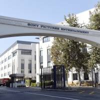 The entrance to the Sony Pictures Entertainment lot is seen in Culver City, California, in 2016. A computer programmer working for the North Korean government was charged with devastating cyberattacks that hacked Sony Pictures Entertainment and unleashed the WannaCry ransomware virus that infected computers in 150 countries and crippled parts of the British health care system, federal prosecutors said Thursday. Cyber insurance market to double by 2020 to over $8 billion: Munich Re