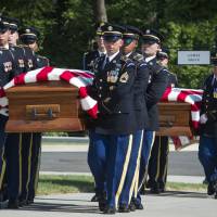The 3rd Infantry Regiment, also known as the Old Guard, casket teams carry the remains of two unknown Civil War Union soldiers to their grave at Arlington National Cemetery in Arlington, Virginia, Thursday. The soldiers were discovered at Manassas National Battlefield and will be buried in Section 81. Arlington National Cemetery opened the new section of gravesites with the burial. Arlington Cemetery opens new section with Civil War burials