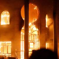 The Iranian Consulate in Basra burns after being torched by protesters during demonstrations over poor public services in Iraq. Iraqis protesting poor public services burn Iranian Consulate in Basra
