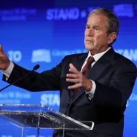 Former President George W. Bush speaks during “Stand-To,” a summit held by the George W. Bush Institute focused on veteran transition, in Washington last year. Bush will be in Florida on Friday to fundraise for Gov. Rick Scott’s bid to oust Democratic Sen. Bill Nelson in a closely watched and expensive campaign. Bush quietly boosting Republicans in places where Trump isn't strong