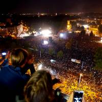 People watch an open air “anti-racism concert” in Chemnitz, Germany, Monday. German authorities target far-right party's youth wing, suspect it's tied with extremist groups
