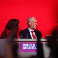 Labour Party leader Jeremy Corbyn, Shadow Foreign Secretary Emily Thornberry (right) and Diane Abbott, the shadow home secretary, sit on the podium at the party’s conference in Liverpool, U.K., on Tuesday. Jeremy Corbyn makes pitch for power as British MPs spar over Brexit