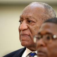Actor and comedian Bill Cosby returns to the courtroom after a lunch break with his spokesman, Andrew Wyatt, and Ebonee Benson at the Montgomery County Courthouse, during his sexual assault trial sentencing in Norristown, Pennsylvania, Monday. Psychologist: Bill Cosby a predator with uncontrollable urges