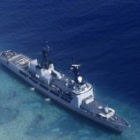 The Philippine Navy ship BRP Gregorio del Pilar is seen Friday after it ran aground during a routine patrol in the vicinity of Half Moon Shoal, which is called Hasa Hasa in the Philippines, off the disputed Spratlys Group of islands in the South China Sea. Two Philippine security officials told The Associated Press on Tuesday that tugboats were used to pull the BRP Gregorio del Pilar from the shallow fringes of Half Moon Shoal before midnight. The frigate ran aground during a routine patrol Wednesday night, damaging some of its propellers. Philippines tows grounded frigate off disputed South China Sea shoal