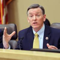 Rep. Paul Gosar speaks during a congressional field hearing on the Affordable Care Act in Apache Junction, Arizona, in 2013. Don't vote for our brother, six siblings of U.S. congressman warn in viral video