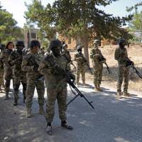Syrian rebel fighters prepare for an upcoming government forces offensive, in the countryside of the rebel-held northern Idlib province on Monday. In recent days, both the government and its ally Russia have stepped up their rhetoric against the rebel presence in Idlib as they gear up for an assault, which could be the last major battle of the civil war that has torn the country apart since 2011. Trump warns Syria, Russia and Iran against Idlib 'tragedy'