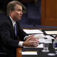 President Donald Trump’s Supreme Court nominee, Brett Kavanaugh, gestures over his notes as he testifies on the third day of his Senate Judiciary Committee confirmation hearing Thursday on Capitol Hill in Washington, to replace retired Justice Anthony Kennedy. Dispute over releasing documents dominates Brett Kavanaugh confirmation hearing
