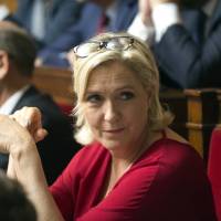 Marine Le Pen attends a session of the National Assembly in Paris on July 31. French judge orders far-right leader Le Pen to undergo psychiatric tests over IS tweets