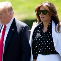 U.S .President Donald Trump and first lady Melania Trump walk to Marine One prior to departing from the South Lawn of the White House in Washington as they travel to Ohio Aug. 24. Melania Trump on Thursday accused the author of an anonymous attack on her husband in the op-ed pages of The New York Times of “sabotaging” the country. Melania Trump defends president, says author of op-ed against him is 'sabotaging' U.S.