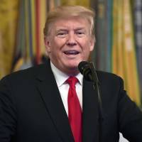 President Donald Trump speaks during a Congressional Medal of Honor Society Reception in the East Room of the White House in Washington Sept. 12. Grim warnings seen for White House, Republicans ahead of midterm elections
