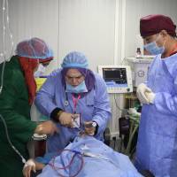 Surgeons operate on a patient at the al-Jamhuri hospital complex in the northern city of Mosul on Sunday. Two hospitals reopened in western Mosul Sunday, the most ravaged part of the northern Iraqi city, after being recaptured from hagadist movements in July 2017. Struggling for normalcy: Two hospitals reopen in war-ravaged Iraqi city of Mosul