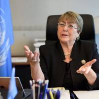 Former Chilean president Michelle Bachelet speaks from her office at the Palais Wilson in Geneva on her first day as new U.N. High Commissioner for Human Rights on Monday. U.N. and U.K. urge Myanmar to free Reuters reporters 'immediately'