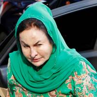 Rosmah Mansor, wife of Malaysia’s former Prime Minister Najib Razak, arrives to give a statement to the Malaysian Anti-Corruption Commission in Putrajaya, Malaysia, on Wednesday. Wife of Malaysia's former PM questioned for second time in 1MDB case