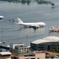 Aircraft are seen on flooded tarmac at the Don Muang airport in Bangkok in 2011, when the year’s monsoon season brought the worst floods in decades and submerged a fifth of the city. As Bangkok hosts climate change talks from Sept. 4, 2018, the sprawling city of more than 10 million faces dire forecasts that it could be partially submerged in just over a decade. Governments 'not ready' for December climate change summit, says Fiji PM Josaia Voreqe Bainimarama at Bangkok talks