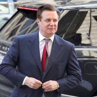 Former Trump campaign manager Paul Manafort arrives for arraignment on a third superseding indictment against him by special counsel Robert Mueller on charges of witness tampering, at U.S. District Court in Washington June 15. U.S. investigators tried to cultivate Russian oligarchs since 2014, had Paul Manafort on radar: NYT