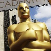 An Oscar statue appears outside the Dolby Theatre for the 87th Academy Awards in Los Angeles in 2015. The organization that bestows the Academy Awards says it is suspending plans to award a new Oscar for popular films amid widespread backlash to the idea. The Academy of Motion Picture Arts and Sciences says Thursday that it will study plans for the category further. Oscars backtrack on plan for a popular film award this year