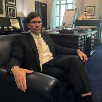 Secretary of the U.S. Army Mark Esper speaks to reporters in his office at the Pentagon on Wednesday in Washington. Poland might not yet be ready for a permanent U.S. military base, the head of the Army said Wednesday, the day after Polish President Andrzej Duda offered to host “Fort Trump.” Poland may not be ready yet for 'Fort Trump' despite Duda's $2 billion overture: U.S. Army head