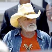 Founding member of the Allman Brothers Band Dickey Betts exits the funeral of Gregg Allman at Snow’s Memorial Chapel, in Macon, Georgia, in 2017. Betts is in “critical but stable” condition after slipping and cracking his head while playing with the family dog in Florida. The Dickey Betts website says the “Ramblin’ Man” singer-songwriter has been sedated since the accident Monday evening in Sarasota. 'Ramblin' Man' singer Dickey Betts critical but stable after falling while playing with dog in Florida
