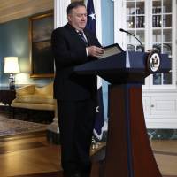 U.S. Secretary of State Mike Pompeo finishes speaking about refugees as he makes a statement to the media at the State Department in Washington on Monday. U.S. again slashing number of refugees it will accept