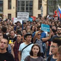Russian protestors attend an unauthorized rally against the government’s proposed reform hiking the pension age, called by the opposition leader Alexei Navalny, in central Moscow on Sunday. Plans to hike the retirement age have led to a rare outburst of public anger and seen President Vladimir Putin’s approval ratings take a hit, despite some efforts to water down the changes. But discontent is unlikely to translate into upsets at the ballot box, with serious opposition candidates in the highest-profile Moscow mayoral vote barred from standing. Hundreds of protesters targeting pension reforms arrested across Russia on polling day