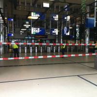 Security officials stand alert at The Central Railway Station in Amsterdam on Friday after two people were hurt in a stabbing incident. Judge orders Amsterdam station stabbing suspect held two more weeks, cites 'terrorist motive'