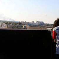 An armed fighter allied to Libya’s internationally recognized government fights with an armed group in Tripoli Saturday. 500,000 children in 'immediate danger' in Tripoli as fighting rages: UNICEF