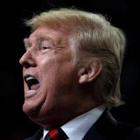 U.S. President Donald Trump speaks during a campaign rally in Springfield, Missouri, on Friday. Trump delays release of Russia probe documents after Justice Department, U.S. allies raise security concerns