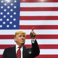U.S. President Donald Trump arrives on stage to speak at a rally at JQH Arena in Springfield, Missouri, on Friday. At U.N., Trump to again confront North Korea's nuclear threat