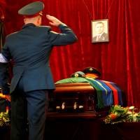 An honor guard stands by the casket of Alexander Zakharchenko, the separatist leader of the self-proclaimed Donetsk People’s Republic, in Donetsk, Ukraine, on Sunday. Tens of thousands mourn Ukraine 'hero' Zakharchenko in rebel stronghold of Donetsk