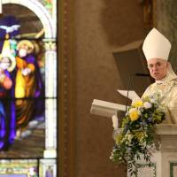 Archbishop Carlo Maria Vigano reads during the episcopal ordination of Auxiliary Bishops James Massa and Witold Mroziewski, in Brooklyn, New York, in 2015. Vatican begins push-back against ex-ambassador over 2015 meeting with gay rights advocate Kim Davis