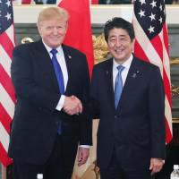 Prime Minister Shinzo Abe and U.S. President Donald Trump pose during Trump’s visit to Tokyo in November. The leaders are expected to meet again in New York next week. Abe and Trump to hold summit on sidelines of U.N. General Assembly next week