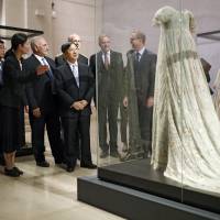 Crown Prince Naruhito is seen during a visit to the Musee des Tissus, which houses one of the world’s largest collection of textiles, in Lyon, southeast France, on Saturday. Crown Prince Naruhito meets Japanese schoolchildren in Lyon at start of nine-day French trip