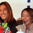 Hello to the face of J-pop: Namie Amuro (right) and Tetsuya Komuro attend a press conference together in China in 1996.