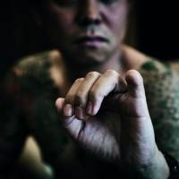 Yubitsume: A yakuza explains how he cut off his little finger. 'Yakuza Tattoo': Inside the secretive world of the yakuza's tattoos