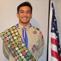 He has his merits: Eagle Scout Austin Koslow wears his full complement of 137 merit badges. This Tokyo Scout's been there, done that, got all the merit badges — and more