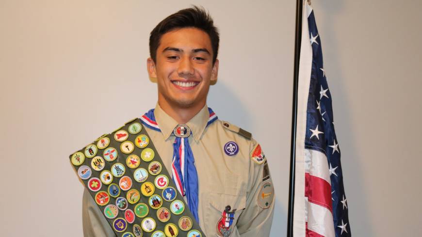 He has his merits: Eagle Scout Austin Koslow wears his full complement of 137 merit badges. This Tokyo Scout's been there, done that, got all the merit badges — and more