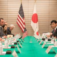 Prime Minister Shinzo Abe participates in an expanded bilateral meeting with U.S. Vice President Mike Pence on Feb. 7 in Tokyo. Japan must do more to support its alliance with the U.S.