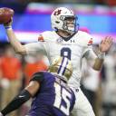 Auburn Tigers quarterback Jarrett Stidham (8) throws a pass against the Washington Huskies in the first quarter at Mercedes-Benz Stadium in Atlanta on Saturday.
