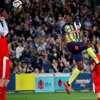 Usain Bolt plays for the Central Coast Mariners in an Aug. 31 match in Gosford, Australia. Usain Bolt taking week-long break from soccer trial with Central Coast Mariners