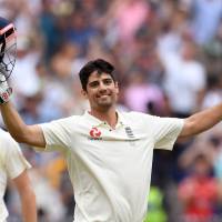 England batsman Alastair Cook celebrates scoring his double century against Australia on the third day of the fourth Ashes cricket Test match at Melbourne Cricket Ground on Dec. 28, 2017. England's Alastair Cook to retire from international cricket after India series