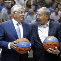 Orlando Magic owner Rich DeVos (right) and then-NBA commissioner David Stern are seen in a May 2010 file photo. Magic owner Richard DeVos dies at age 92