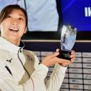 Japanese swimmer Rikako Ikee poses with her MVP trophy at an awards ceremony for the 18th Asian Games in Jakarta on Sunday
