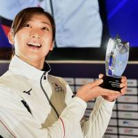 Japanese swimmer Rikako Ikee poses with her MVP trophy at an awards ceremony for the 18th Asian Games in Jakarta on Sunday Golden girl Rikako Ikee becomes first female MVP in Asian Games history