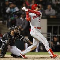 The Angels’ Shohei Ohtani connects on a three-run triple during the ninth inning against the White Sox on Saturday. Shohei Ohtani connects on three-run triple during Angels' win over White Sox